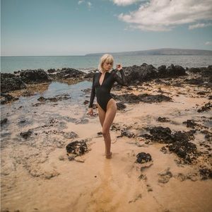 One Piece Long Sleeve Swimsuit Bodysuit with a full front zip and mock neck. XS